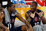 BEIJING - AUGUST 16:  (R-L) Kobe Bryant #10 of the United States talks with teammate Dwight Howard #11 while taking on Spain during the group B preliminary basketball game at the Beijing Olympic Basketball Gymnasium on Day 8 of the Beijing 2008 Olympic Games on August 16, 2008 in Beijing, China.  (Photo by Streeter Lecka/Getty Images)