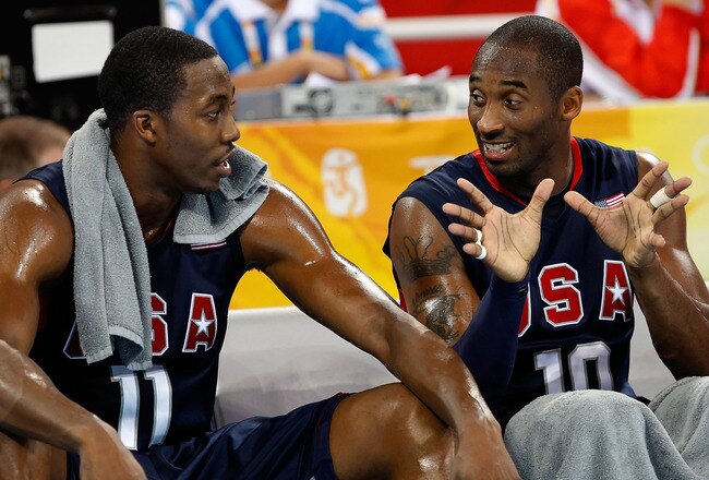 BEIJING - AUGUST 16:  (R-L) Kobe Bryant #10 of the United States talks with teammate Dwight Howard #11 while taking on Spain during the group B preliminary basketball game at the Beijing Olympic Basketball Gymnasium on Day 8 of the Beijing 2008 Olympic Games on August 16, 2008 in Beijing, China.  (Photo by Streeter Lecka/Getty Images)