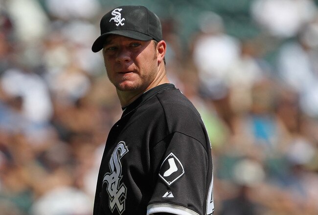 CHICAGO, IL - AUGUST 31:  Jake Peavy #44 of the Chicago White Sox walks off of the field at end of the 1st inning after giving up 6 runs to the Minnesota Twins at U.S. Cellular Field on August 31, 2011 in Chicago, Illinois. The Twins defeated the White Sox 7-6.  (Photo by Jonathan Daniel/Getty Images)