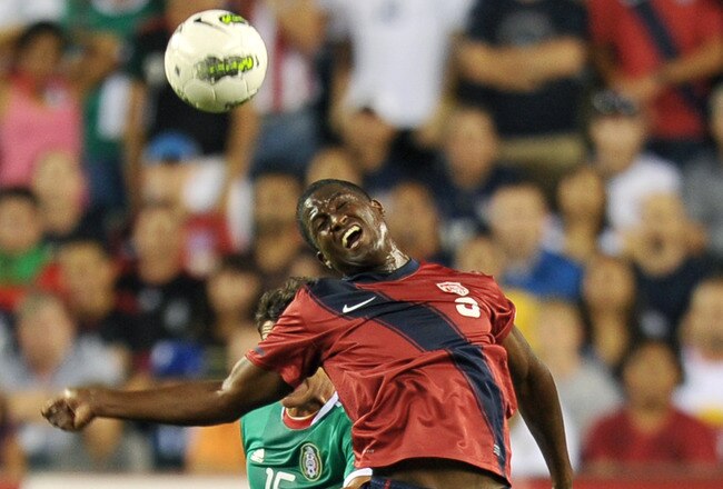 PHILADELPHIA, PA - AUGUST 10: Edson Buddle #9 of the United States heads the ball in front of Hector Moreno #15 of Mexico at Lincoln Financial Field on August 10, 2011 in Philadelphia, Pennsylvania. (Photo by Drew Hallowell/Getty Images)