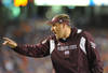 GAINESVILLE, FL - OCTOBER 16:  Coach Dan Mullen of the Mississippi State Bulldogs directs play against the Florida Gators  October 16, 2010 Ben Hill Griffin Stadium at Gainesville, Florida.  (Photo by Al Messerschmidt/Getty Images)