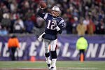 FOXBORO, MA - JANUARY 14:  Tom Brady #12 of the New England Patriots throws a pss against the Denver Broncos during their AFC Divisional Playoff Game at Gillette Stadium on January 14, 2012 in Foxboro, Massachusetts.  (Photo by Elsa/Getty Images)