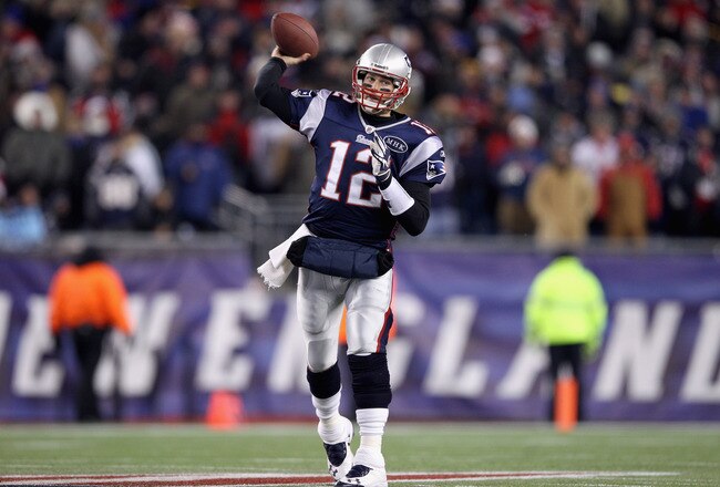 FOXBORO, MA - JANUARY 14:  Tom Brady #12 of the New England Patriots throws a pss against the Denver Broncos during their AFC Divisional Playoff Game at Gillette Stadium on January 14, 2012 in Foxboro, Massachusetts.  (Photo by Elsa/Getty Images)