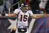 FOXBORO, MA - JANUARY 14:  Tim Tebow #15 of the Denver Broncos gestures as he reacts against the New England Patriots during their AFC Divisional Playoff Game at Gillette Stadium on January 14, 2012 in Foxboro, Massachusetts.  (Photo by Jim Rogash/Getty Images)