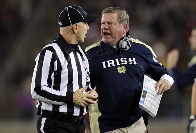 STANFORD, CA - NOVEMBER 26:  Notre Dame Fighting Irish head coach Brian Kelly argues a call with side judge Glenn Crowther during their game against the Stanford Cardinal at Stanford Stadium on November 26, 2011 in Stanford, California.  (Photo by Ezra Shaw/Getty Images)