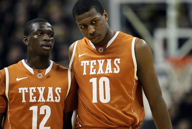 COLUMBIA, MO - JANUARY 14:  Myck Kabongo #12 and Jonathan Holmes #10 of the Texas Longhorns walk onto the court after a timeout during the game against the Missouri Tigers on January 14, 2012 at Mizzou Arena in Columbia, Missouri.  (Photo by Jamie Squire/Getty Images)