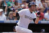 DENVER, CO - JULY 21:  Seth Smith #7 of the Colorado Rockies takes an at bat against the Atlanta Braves at Coors Field on July 21, 2011 in Denver, Colorado.  (Photo by Doug Pensinger/Getty Images)