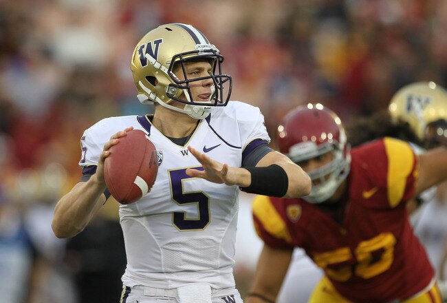 LOS ANGELES, CA - NOVEMBER 12:  Quarterback Nick Montana #5 of the Washington Huskies throws a pass against the USC Trojans at the Los Angeles Memorial Coliseum on November 12, 2011 in Los Angeles, California.  USC won 40-17.  (Photo by Stephen Dunn/Getty Images)