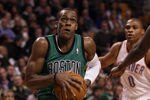BOSTON, MA - JANUARY 16:  Rajon Rondo #9 of the Boston Celtics heads for the net as Russell Westbrook #0 of the Oklahoma City Thunder defends on January 16, 2012 at TD Garden in Boston, Massachusetts. NOTE TO USER: User expressly acknowledges and agrees that, by downloading and or using this photograph, User is consenting to the terms and conditions of the Getty Images License Agreement.  (Photo by Elsa/Getty Images)