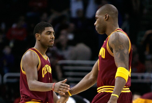 CLEVELAND, OH - DECEMBER 26:  Kyrie Irving #2 and Antawn Jamison #4 of the Cleveland Cavaliers react after a play against the Toronto Raptors during the season opener at Quicken Loans Arena on December 26, 2011 in Cleveland, Ohio. NOTE TO USER: User expressly acknowledges and agrees that, by downloading and or using this photograph, User is consenting to the terms and conditions of the Getty Images License Agreement.  (Photo by Mike Lawrie/Getty Images)