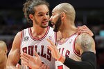 CHICAGO, IL - MAY 26:  Joakim Noah #13 and Carlos Boozer #5 of the Chicago Bulls talk on court against the Miami Heat in Game Five of the Eastern Conference Finals during the 2011 NBA Playoffs on May 26, 2011 at the United Center in Chicago, Illinois. The Heat won 83-80. NOTE TO USER: User expressly acknowledges and agrees that, by downloading and or using this photograph, User is consenting to the terms and conditions of the Getty Images License Agreement.  (Photo by Mike Ehrmann/Getty Images)
