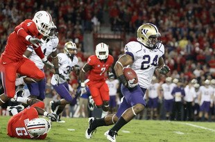 TUCSON, AZ - OCTOBER 23:  Runningback Jesse Callier #24 of the Washington Huskies rushes the football during the college football game against the Arizona Wildcats at Arizona Stadium on October 23, 2010 in Tucson, Arizona. The Wildcats defeated the Huskies 44-14.  (Photo by Christian Petersen/Getty Images)