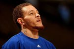 DENVER - JANUARY 08:  Delonte West #13 of the Cleveland Cavaliers looks on during warm ups prior to facing the Denver Nuggets during NBA action at Pepsi Center on January 8, 2010 in Denver, Colorado. The Nuggets defeated the Cavaliers 99-97. NOTE TO USER: User expressly acknowledges and agrees that, by downloading and/or using this Photograph, user is consenting to the terms and conditions of the Getty Images License Agreement.  (Photo by Doug Pensinger/Getty Images)