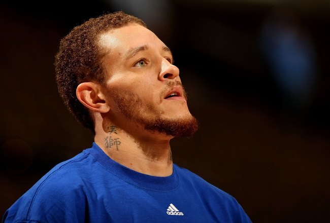 DENVER - JANUARY 08:  Delonte West #13 of the Cleveland Cavaliers looks on during warm ups prior to facing the Denver Nuggets during NBA action at Pepsi Center on January 8, 2010 in Denver, Colorado. The Nuggets defeated the Cavaliers 99-97. NOTE TO USER: User expressly acknowledges and agrees that, by downloading and/or using this Photograph, user is consenting to the terms and conditions of the Getty Images License Agreement.  (Photo by Doug Pensinger/Getty Images)