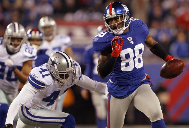 EAST RUTHERFORD, NJ - JANUARY 1: Hakeem Nicks #88 of the New York Giants gets past Terence Newman #41 of the Dallas Cowboys after making a catch during a game at MetLife Stadium on January 1, 2012 in East Rutherford, New Jersey. (Photo by Rich Schultz /Getty Images)