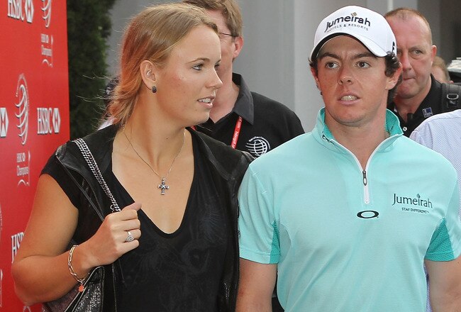 SHANGHAI, CHINA - NOVEMBER 05:  Rory McIlroy of Northern Ireland walks with his girlfriend Caroline Wozniacki after the third round of the WGC-HSBC Champions at Sheshan International Golf Club on November 5, 2011 in Shanghai, China.  (Photo by Scott Halleran/Getty Images)
