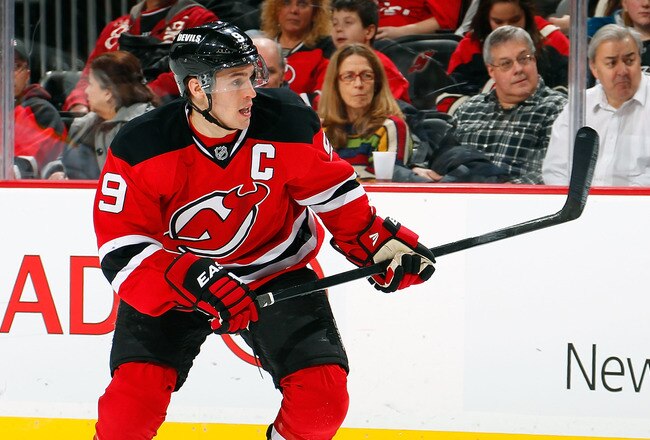 NEWARK, NJ - JANUARY 04:  Zach Parise #9 of the New Jersey Devils skates during an NHL hockey game against the Boston Bruins at Prudential Center on January 4, 2012 in Newark, New Jersey.  (Photo by Paul Bereswill/Getty Images)