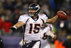 FOXBORO, MA - JANUARY 14:  Tim Tebow #15 of the Denver Broncos throws a pass against the New England Patriots during their AFC Divisional Playoff Game at Gillette Stadium on January 14, 2012 in Foxboro, Massachusetts.  (Photo by Al Bello/Getty Images)