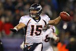 FOXBORO, MA - JANUARY 14:  Tim Tebow #15 of the Denver Broncos throws a pass against the New England Patriots during their AFC Divisional Playoff Game at Gillette Stadium on January 14, 2012 in Foxboro, Massachusetts.  (Photo by Al Bello/Getty Images)