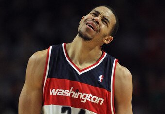 CHICAGO, IL - JANUARY 11: JaVale McGee #34 of the Washington Wizards reacts after being called for a foul against the Chicago Bulls at the United Center on January 11, 2012 in Chicago, Illinois. The Bulls defeated the Wizards 78-64. NOTE TO USER: User expressly acknowledges and agrees that, by downloading and or using this photograph, User is consenting to the terms and conditions of the Getty Images License Agreement. (Photo by Jonathan Daniel/Getty Images)