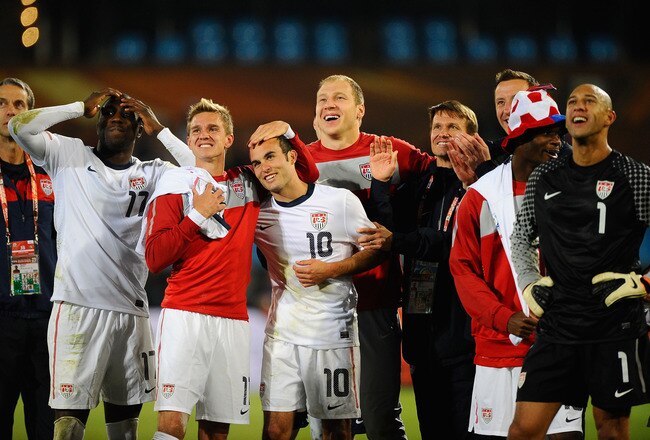 PRETORIA, SOUTH AFRICA - JUNE 23:  (L-R) Jozy Altidore, Stuart Holden, Landon Donovan and Tim Howard of the United States celebrate with team mates, the victory that sends the USA through to the second round in the 2010 FIFA World Cup South Africa Group C match between USA and Algeria at the Loftus Versfeld Stadium on June 23, 2010 in Tshwane/Pretoria, South Africa.  (Photo by Kevork Djansezian/Getty Images)