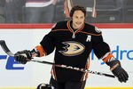 WINNIPEG, CANADA - DECEMBER 17: Fans go wild as Teemu Selanne #8 of the Anaheim Ducks warms up on the ice before a game against the Winnipeg Jets in NHL action at the MTS Centre on December 17, 2011 in Winnipeg, Manitoba, Canada. This is the first time Selanne has returned to play hockey in Winnipeg, where he began his NHL hockey career with the original Winnipeg Jets in 1992. (Photo by Marianne Helm/Getty Images)