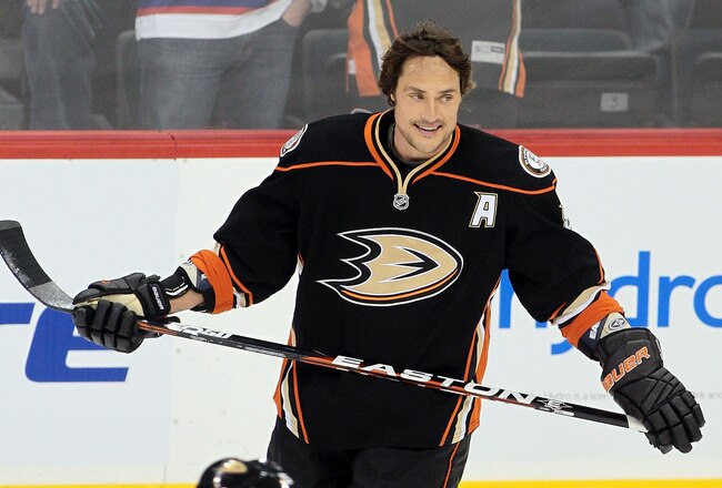 WINNIPEG, CANADA - DECEMBER 17: Fans go wild as Teemu Selanne #8 of the Anaheim Ducks warms up on the ice before a game against the Winnipeg Jets in NHL action at the MTS Centre on December 17, 2011 in Winnipeg, Manitoba, Canada. This is the first time Selanne has returned to play hockey in Winnipeg, where he began his NHL hockey career with the original Winnipeg Jets in 1992. (Photo by Marianne Helm/Getty Images)