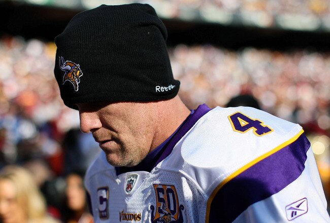LANDOVER, MD - NOVEMBER 28:  Brett Favre #4 of the Minnesota Vikings walks off the field at the end of the first half against the Washington Redskins at FedExField November 28, 2010 in Landover, Maryland. The Vikings won the game 17-13.  (Photo by Win McNamee/Getty Images)