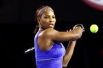 MELBOURNE, AUSTRALIA - JANUARY 17:  Serena Williams of the USA plays a backhand in her first round match against Tamira Paszek of Austria during day two of the 2012 Australian Open at Melbourne Park on January 17, 2012 in Melbourne, Australia.  (Photo by Ryan Pierse/Getty Images)