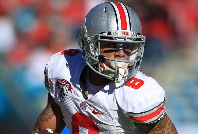 JACKSONVILLE, FL - JANUARY 02:  Devier Posey #8 of Ohio State Buckeyes runs upfield during the first half at the TaxSlayer.com Gator Bowl against the Florida Gators at EverBank Field on January 2, 2012 in Jacksonville, Florida.  (Photo by Scott Halleran/Getty Images)