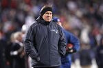 FOXBORO, MA - JANUARY 14:  Head coach Bill Belichick of the New England Patriots looks on during warm ups against the Denver Broncos during their AFC Divisional Playoff Game at Gillette Stadium on January 14, 2012 in Foxboro, Massachusetts.  (Photo by Elsa/Getty Images)