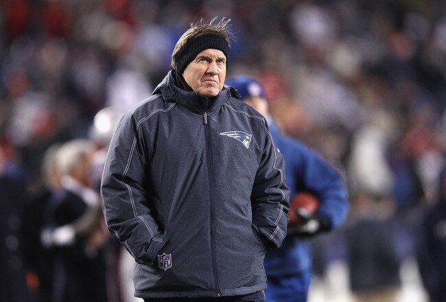 FOXBORO, MA - JANUARY 14:  Head coach Bill Belichick of the New England Patriots looks on during warm ups against the Denver Broncos during their AFC Divisional Playoff Game at Gillette Stadium on January 14, 2012 in Foxboro, Massachusetts.  (Photo by Elsa/Getty Images)