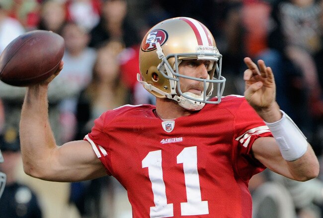SAN FRANCISCO, CA - JANUARY 14:  Alex Smith #11 of the San Francisco 49ers looks to pass from the pocket during the NFC Divisional playoff game against the New Orleans Saints at Candlestick Park on January 14, 2012 in San Francisco, California.  (Photo by Thearon W. Henderson/Getty Images)