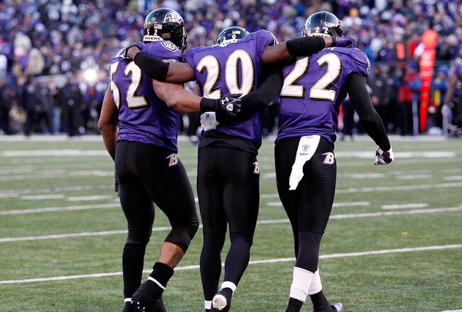 BALTIMORE, MD - JANUARY 15:  Ray Lewis #52 and  Jimmy Smith #22 help Ed Reed #20 of the Baltimore Ravens off the field late in the fourth quarter of the Ravens 20-13 win over the Houston Texans during the AFC Divisional playoff game at M&T Bank Stadium on January 15, 2012 in Baltimore, Maryland.  (Photo by Rob Carr/Getty Images)