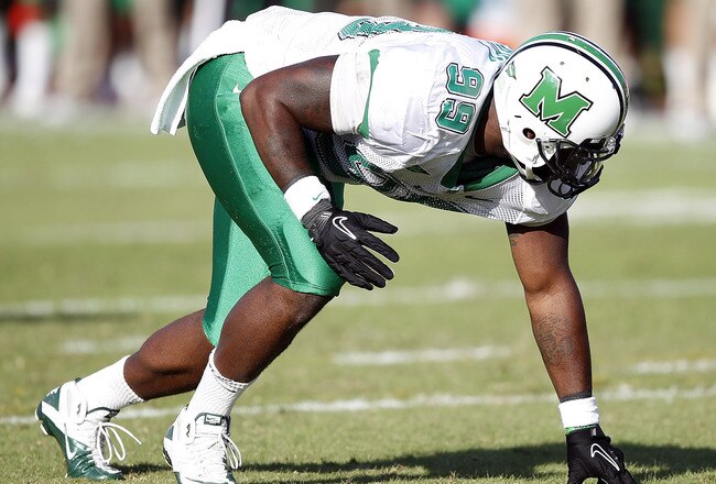 HOUSTON - OCTOBER 22:  Defensive lineman Vinny Curry #99 of the Marshall Thundering Herd lines up against the Houston Cougars at Robertson Stadium on October 22, 2011 in Houston, Texas.  (Photo by Bob Levey/Getty Images)