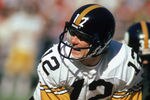 ATLANTA - NOVEMBER 1:  Quarterback Terry Bradshaw #12 of the Pittsburgh Steelers calls the play during the game against the Atlanta Falcons at Fulton County Stadium on November 1, 1981 in Atlanta, Georgia. The Steelers defeated the Falcons 34-20.  (Photo by: Scott Cunningham/Getty Images).