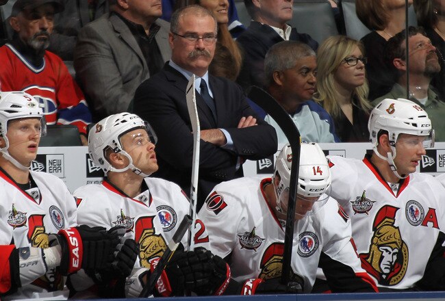 TORONTO, ON - NOVEMBER 12:  Head coach Paul MacLean of the Ottawa Senators coaches his team against the Toronto Maple Leafs at the Air Canada Centre on November 12, 2011 in Toronto, Ontario, Canada. The Senators defeated the Maple Leafs 5-2.  (Photo by Bruce Bennett/Getty Images)