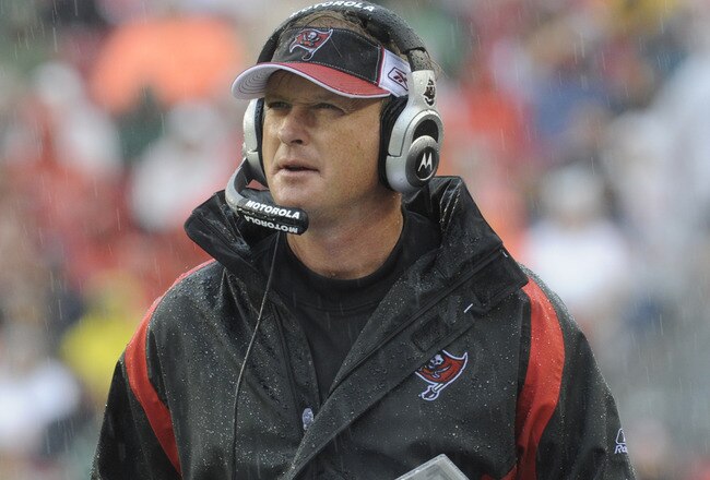 TAMPA, FL - NOVEMBER 30:  Coach Jon Gruden of the Tampa Bay Buccaneers checks the scoreboard against the New Orleans Saints at Raymond James Stadium on November 30, 2008 in Tampa, Florida.  (Photo by Al Messerschmidt/Getty Images)