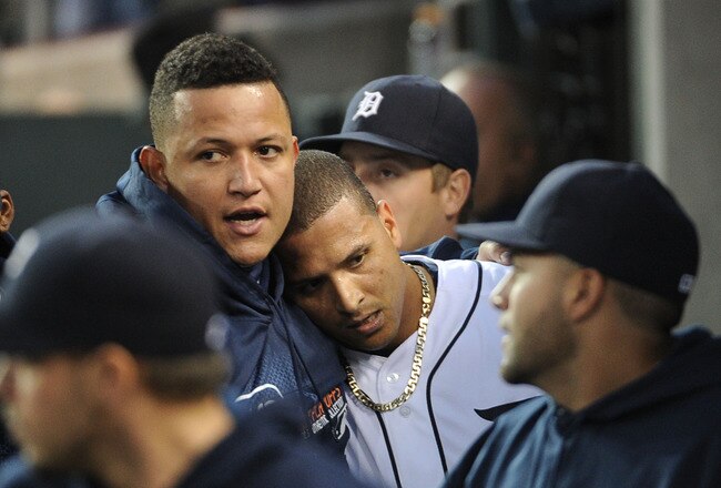 DETROIT, MI - OCTOBER 13:  Miguel Cabrera #24 hugs Victor Martinez #41 of the Detroit Tigers in the sixth inning of Game Five of the American League Championship Series against the Texas Rangers at Comerica Park on October 13, 2011 in Detroit, Michigan.  (Photo by Harry How/Getty Images)