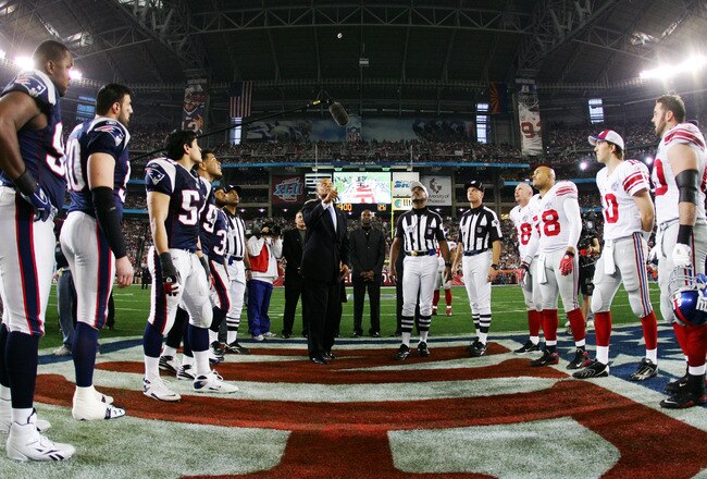 GLENDALE, AZ - FEBRUARY 03:  Hall of Famer Ronnie Lott performs the coin toss before the New York Giants take on the New England Patriots during Super Bowl XLII on February 3, 2008 at the University of Phoenix Stadium in Glendale, Arizona.  (Photo by Harry How/Getty Images)