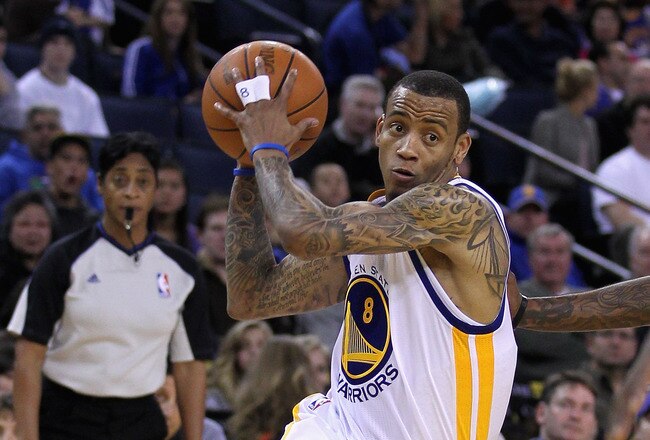 OAKLAND, CA - MARCH 25: Monta Ellis #8 of the Golden State Warriors drives to the basket against the Toronto Raptors at Oracle Arena on March 25, 2011 in Oakland, California. NOTE TO USER: User expressly acknowledges and agrees that, by downloading and or using this photograph, User is consenting to the terms and conditions of the Getty Images License Agreement.  (Photo by Ezra Shaw/Getty Images)