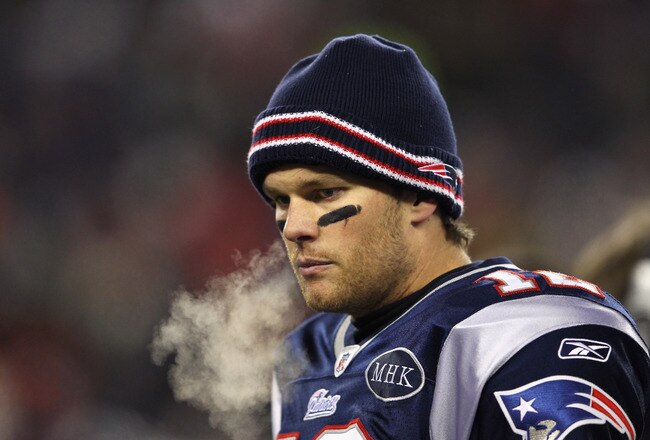FOXBORO, MA - JANUARY 14:  Tom Brady #12 of the New England Patriots looks on from the sideline against the Denver Broncos during their AFC Divisional Playoff Game at Gillette Stadium on January 14, 2012 in Foxboro, Massachusetts.  (Photo by Al Bello/Getty Images)