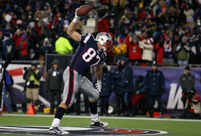 FOXBORO, MA - JANUARY 14:  Rob Gronkowski #87 of the New England Patriots celebrates by spiking the ball after he scored a 19-yard touchdown reception in the second quarter against the Denver Broncos during their AFC Divisional Playoff Game at Gillette Stadium on January 14, 2012 in Foxboro, Massachusetts.  (Photo by Al Bello/Getty Images)