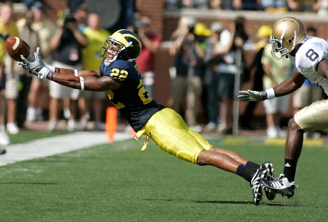 ANN ARBOR, MI - SEPTEMBER 12:  Wide reciever Darryl Stonum #22 misses a catch early in the first half against Notre Dame at Michigan Stadium on September 12, 2009 in Ann Arbor, Michigan.  (Photo by Domenic Centofanti/Getty Images)