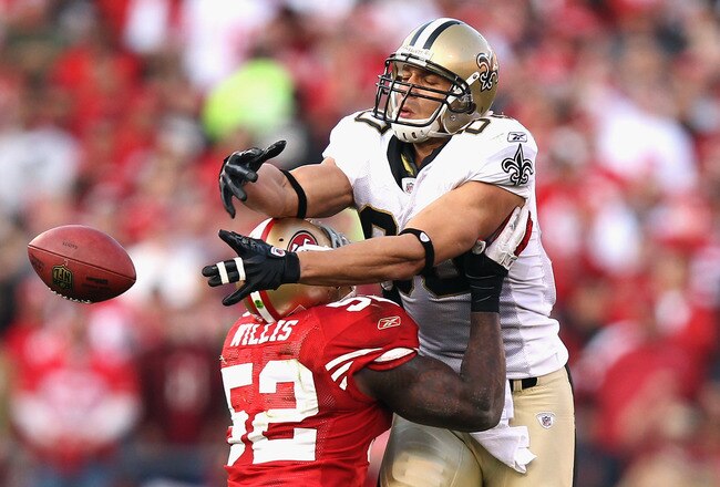SAN FRANCISCO, CA - JANUARY 14:  Patrick Willis #52 of the San Francisco 49ers forces an incomplete pass against Jimmy Graham #80 of the New Orleans Saints during the fourth quarter of the NFC Divisional playoff game at Candlestick Park on January 14, 2012 in San Francisco, California.  (Photo by Ezra Shaw/Getty Images)