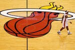 MIAMI, FL - JANUARY 17: LeBron James #6 of the Miami Heat walks up the floor during a game against the San Antonio Spurs at American Airlines Arena on January 17, 2012 in Miami, Florida. NOTE TO USER: User expressly acknowledges and agrees that, by downloading and/or using this Photograph, User is consenting to the terms and conditions of the Getty Images License Agreement.  (Photo by Mike Ehrmann/Getty Images)