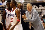 PHILADELPHIA, PA - APRIL 24: Coach Doug Collins of the Philadelphia 76ers gestures to players Jrue Holiday #11 (L) and Jodie Meeks #20 during the second half in Game Four of the Eastern Conference Quarterfinals in the 2011 NBA Playoffs at Wells Fargo Center on April 24, 2011 in Philadelphia, Pennsylvania. NOTE TO USER: User expressly acknowledges and agrees that, by downloading and/or using this Photograph, User is consenting to the terms and conditions of the Getty Images License Agreement.  (Photo by Rob Carr/Getty Images)