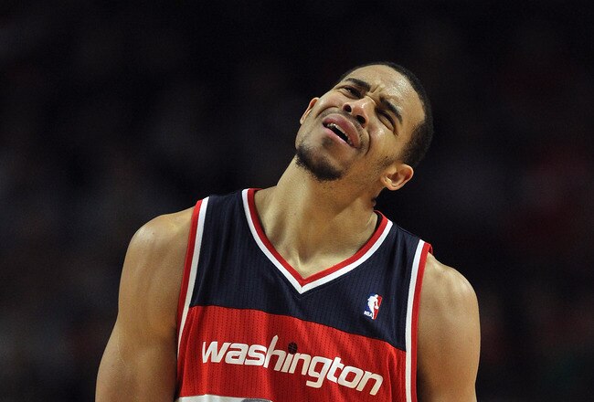 CHICAGO, IL - JANUARY 11: JaVale McGee #34 of the Washington Wizards reacts after being called for a foul against the Chicago Bulls at the United Center on January 11, 2012 in Chicago, Illinois. The Bulls defeated the Wizards 78-64. NOTE TO USER: User expressly acknowledges and agrees that, by downloading and or using this photograph, User is consenting to the terms and conditions of the Getty Images License Agreement. (Photo by Jonathan Daniel/Getty Images)