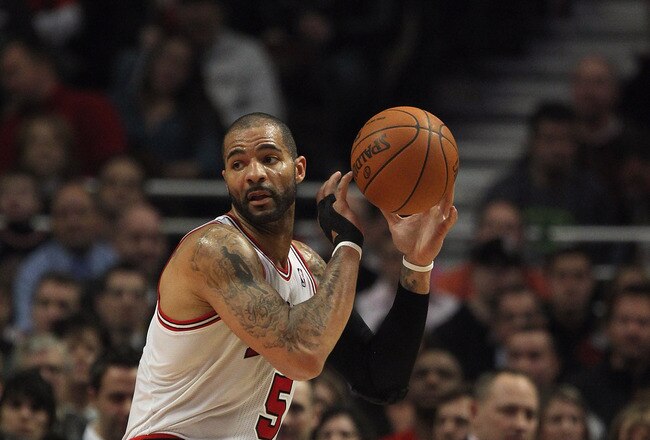 CHICAGO, IL - JANUARY 09: Carlos Boozer #5 of the Chicago Bulls looks to pass against the Detroit Pistons at the United Center on January 9, 2012 in Chicago, Illinois. The Bulls defeated the Pistons 92-68. NOTE TO USER: User expressly acknowledges and agrees that, by downloading and or using this photograph, User is consenting to the terms and conditions of the Getty Images License Agreement. (Photo by Jonathan Daniel/Getty Images)