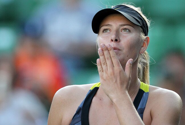 TOKYO, JAPAN - SEPTEMBER 28:  Maria Sharapova of Russia blows a kiss to the audience after winning her match against Julia Goerges of Germany during the day four of the Toray Pan Pacific Open at Ariake Colosseum on September 28, 2011 in Tokyo, Japan.  (Photo by Kiyoshi Ota/Getty Images)
